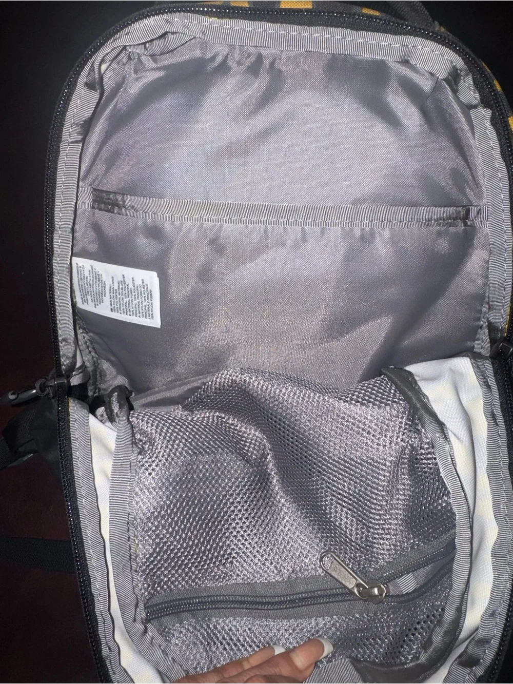 The North Face Black and Yellow Leopard Print Mini Backpack